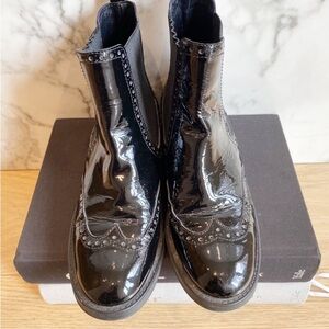 Aquatalia Black patent wing-tip Chelsea boots.